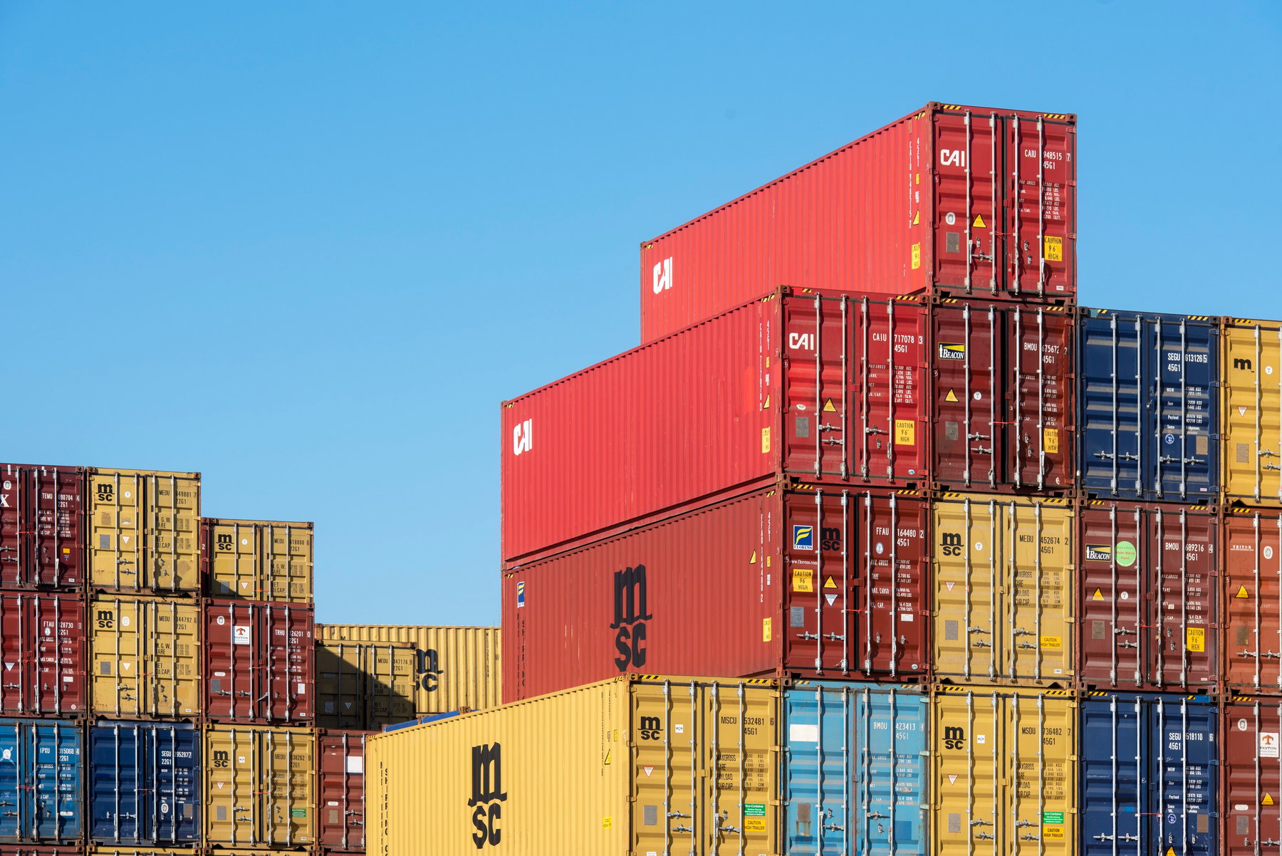 Cargo vessel loaded with containers under way